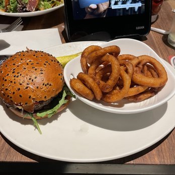 Yard House - Kurobuta Pork Burger with Onion Rings - New American Near Me - Northridge, California Yard House - Kurobuta Pork Burger with Onion Rings - New American Near Me - Northridge, California