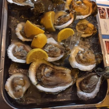 Keith's Oyster Bar - Raw oysters - Seafood Near Me - Cocoa Beach, Florida Keith's Oyster Bar - Raw oysters - Seafood Near Me - Cocoa Beach, Florida
