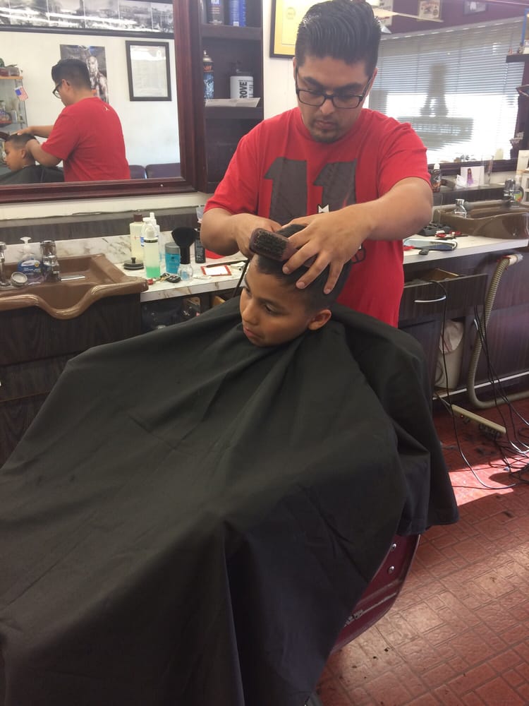 Uptown Barber Shop Logo
