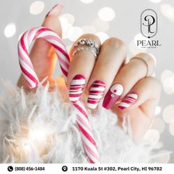 Pearl Nails And Salon - Classic French tips paired with bold candy cane stripes. A sweet and stylish treat for your hands.  Walk-ins are always welcome!