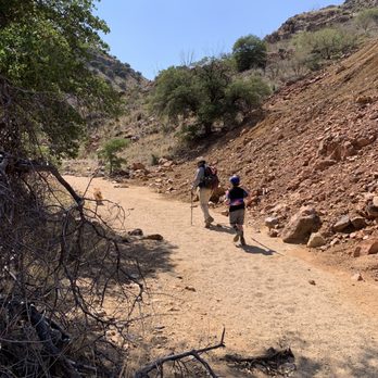 Courtland Ghost Town - Michael taking my son for a souvenir rock. - Tours Near Me - Elfrida, Arizona