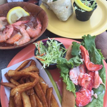 The Oar - Lobster roll with a side of slaw, beer batter fries and Mediterranean wrap - Seafood Near Me - Block Island, Rhode Island