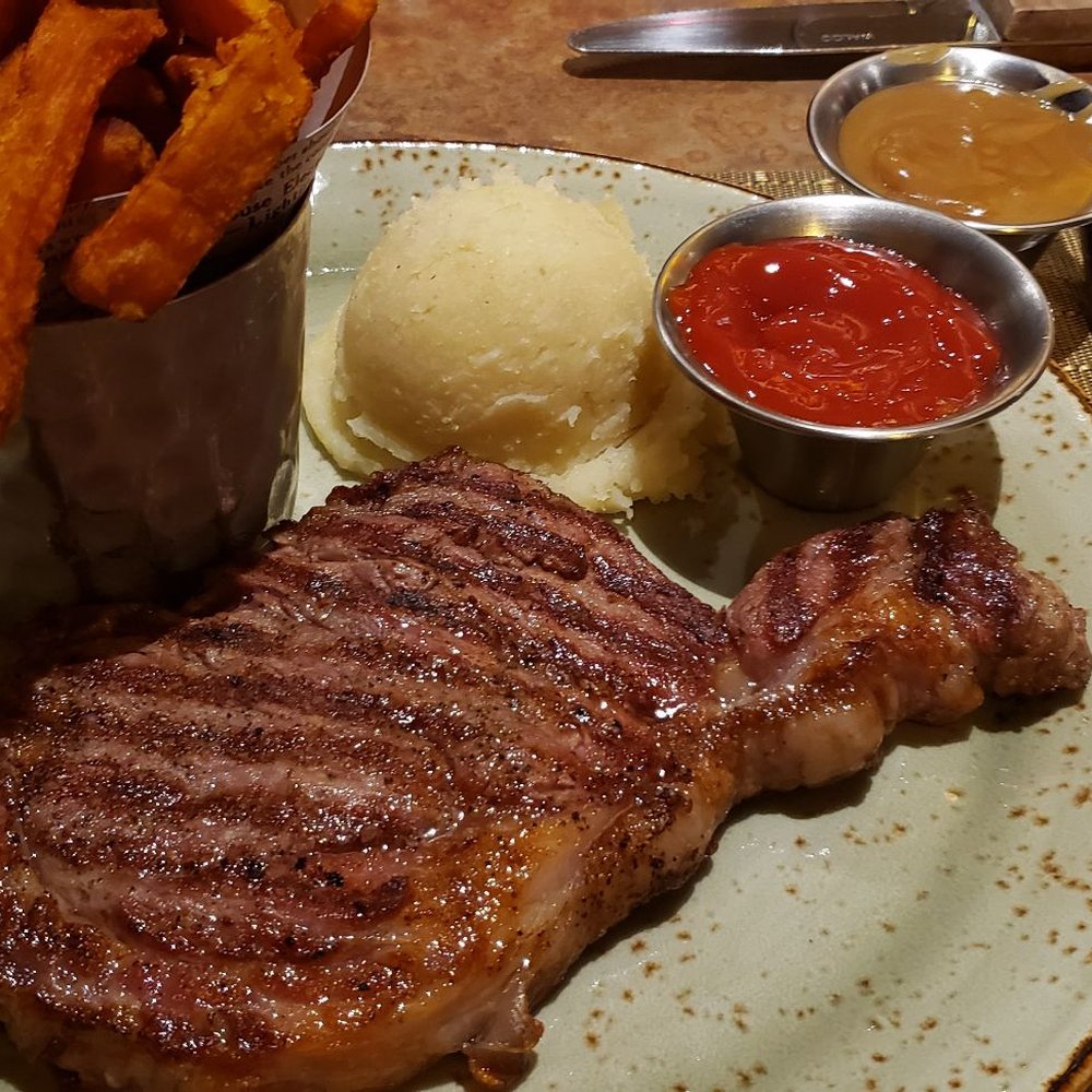 The Diamond Cafe - 10oz rib eye, very bland with no flavor, mashed potatoes was hard, best part was the sweet potato fries. - Cafes Near Me - Tucson, Arizona The Diamond Cafe - 10oz rib eye, very bland with no flavor, mashed potatoes was hard, best part was the sweet potato fries. - Cafes Near Me - Tucson, Arizona