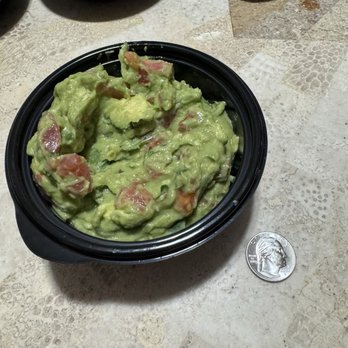 Uncle Julio's - Supposedly a "large" guacamole - Mexican Near Me - Arlington, Texas Uncle Julio's - Supposedly a "large" guacamole - Mexican Near Me - Arlington, Texas