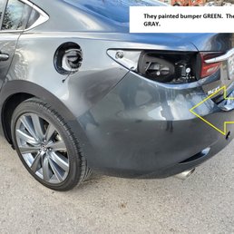 Green Bumper on Gray Car