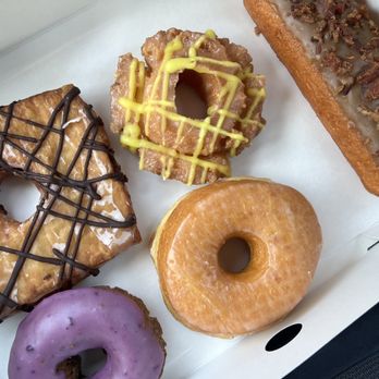 Randy’s Donuts - Lemon Old Fashioned, maple Bacon Maple Long John, Blueberry Iced Cake, Glazed Raised, Chocolate Crondy - Coffee & Tea Near Me - San Diego, California