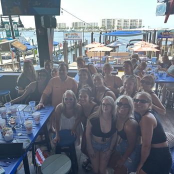Tailfins Waterfront Grill - Photo with one of the owners - Seafood Near Me - Destin, Florida Tailfins Waterfront Grill - Photo with one of the owners - Seafood Near Me - Destin, Florida