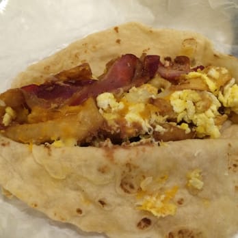 La Estacion - Surprise burrito (bacon/egg/cheese/bean/fries). Delicious! - Mexican Near Me - Galveston, Texas La Estacion - Surprise burrito (bacon/egg/cheese/bean/fries). Delicious! - Mexican Near Me - Galveston, Texas