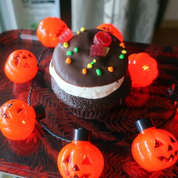 Crave Cupcakes - a chocolate frosted cupcake with sprinkles and pumpkins - Desserts Near Me - Edmonton, Alberta Crave Cupcakes - a chocolate frosted cupcake with sprinkles and pumpkins - Desserts Near Me - Edmonton, Alberta