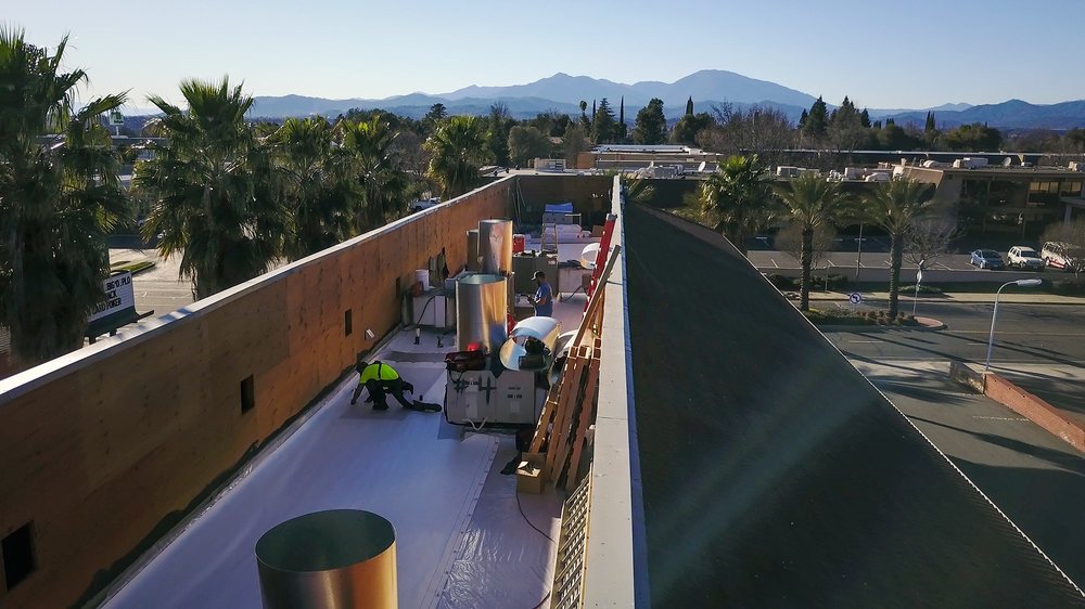 Slide of Boster Roofing