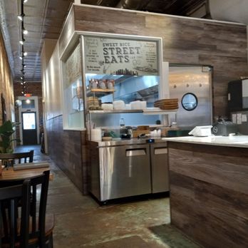 Sweet Rice - The Back leads to restroom and additional parking with a deck. - Thai Near Me - Dallas, Texas Sweet Rice - The Back leads to restroom and additional parking with a deck. - Thai Near Me - Dallas, Texas