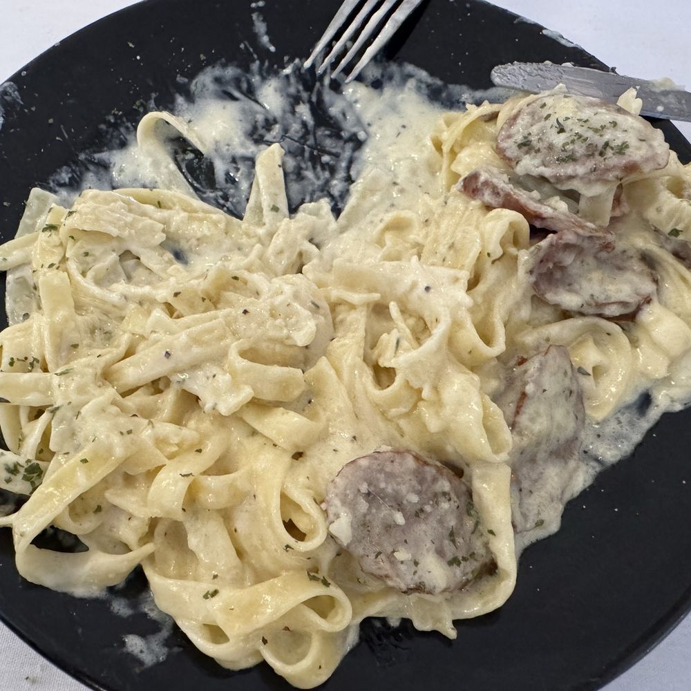 Fettuccini Alfredo with Italian sausage Fettuccini Alfredo with Italian sausage