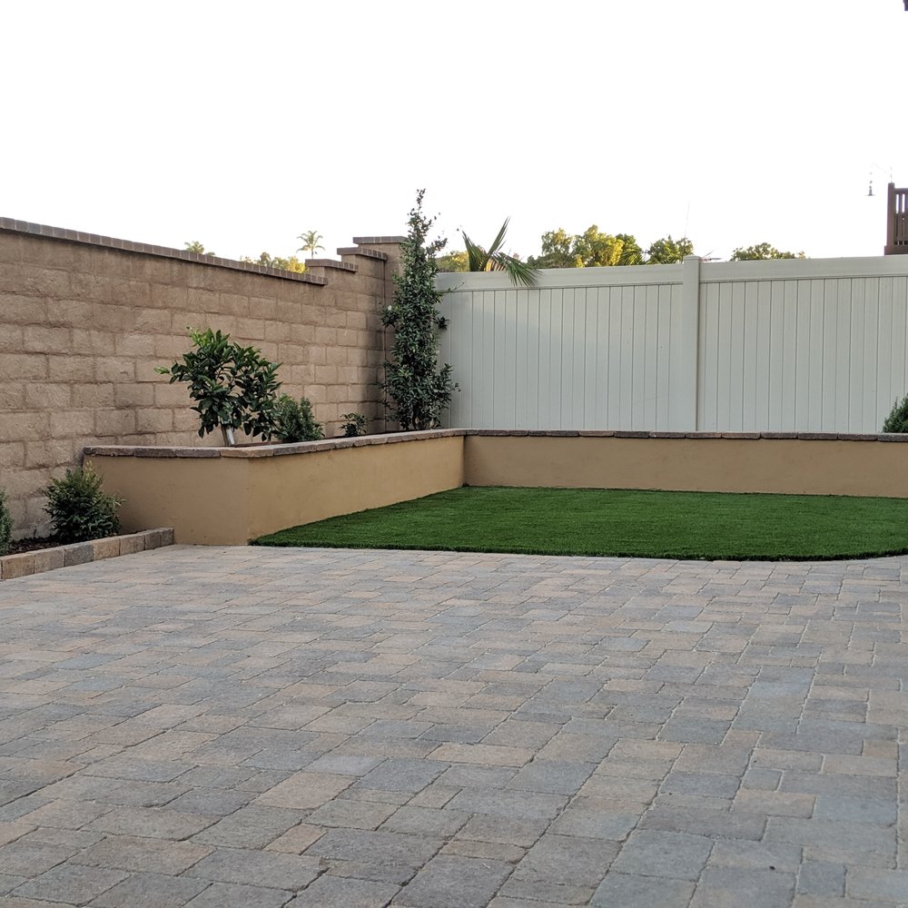 Pavers, artificial grass, raised planters box Pavers, artificial grass, raised planters box