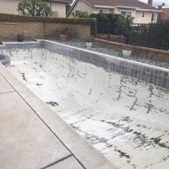 Alan Smith Pool Plastering & Remodeling - Tuesday the existing plaster was hydroblasted. Wednesday the cleanup and prep crews came. - Pool & Hot Tub Service Near Me - Orange, California