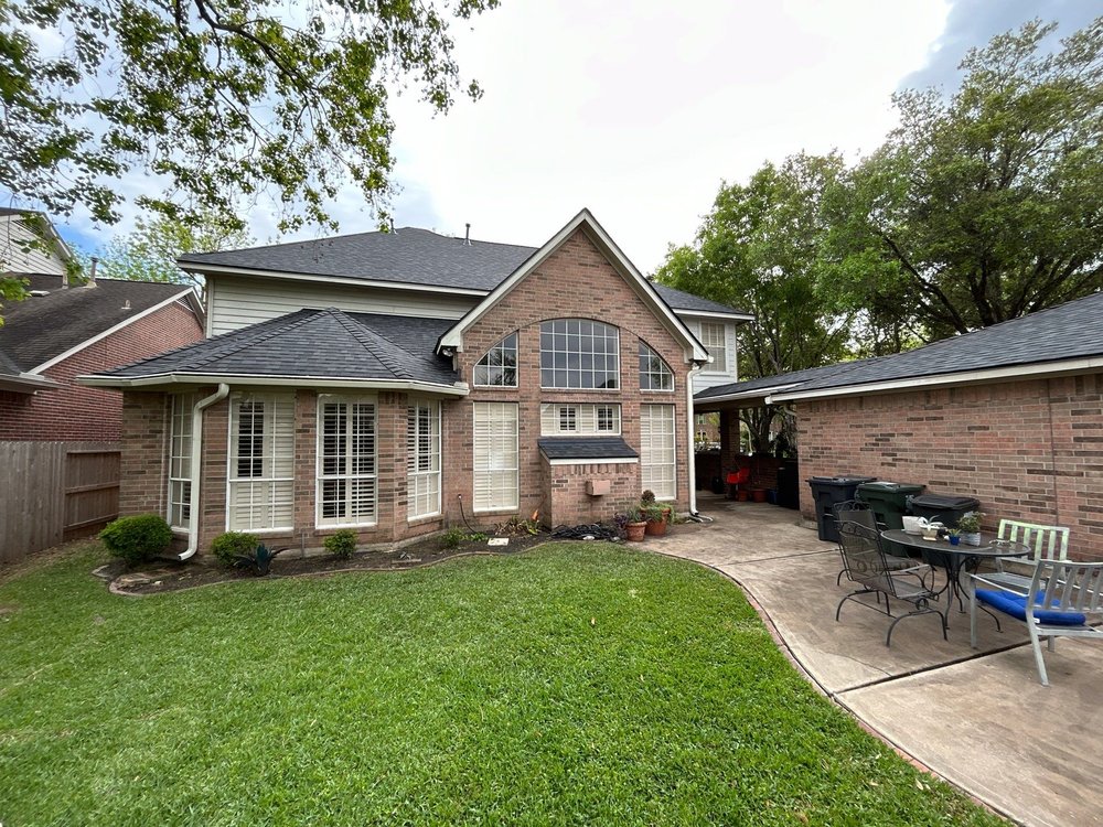 Slide of Reign Roofing