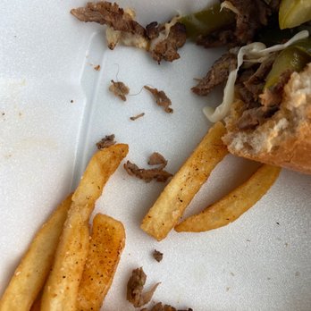 Legacy Pub - a half eaten sandwich and french fries - American Near Me - Lafayette, Indiana