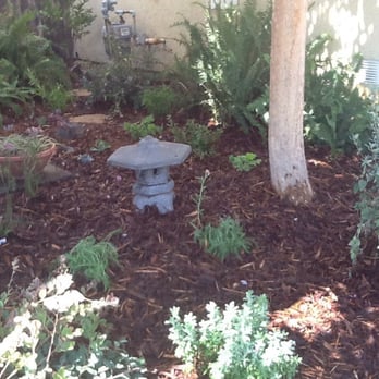 Metro Landscape - a stone bench in a garden - Landscaping Near Me - Simi Valley, California Metro Landscape - a stone bench in a garden - Landscaping Near Me - Simi Valley, California