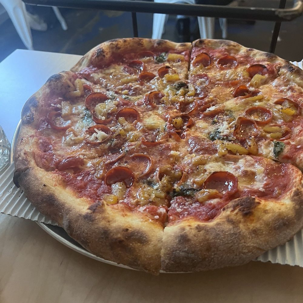 Cornelly - Hornet pizza - Italian Near Me - Seattle, Washington Cornelly - Hornet pizza - Italian Near Me - Seattle, Washington