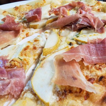 Pasta Moon - Pear and prosciutto pizza. - Italian Near Me - Half Moon Bay, California Pasta Moon - Pear and prosciutto pizza. - Italian Near Me - Half Moon Bay, California