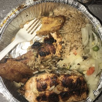 T&G Flavors - Grilled Salmon no type of sauce or flavor with cabbage and rice and peas - Caribbean Near Me - Queens, New York T&G Flavors - Grilled Salmon no type of sauce or flavor with cabbage and rice and peas - Caribbean Near Me - Queens, New York