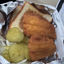 Kings Grill - Supposed to be 2 pieces of fish but in actuality its 1 piece cut in half