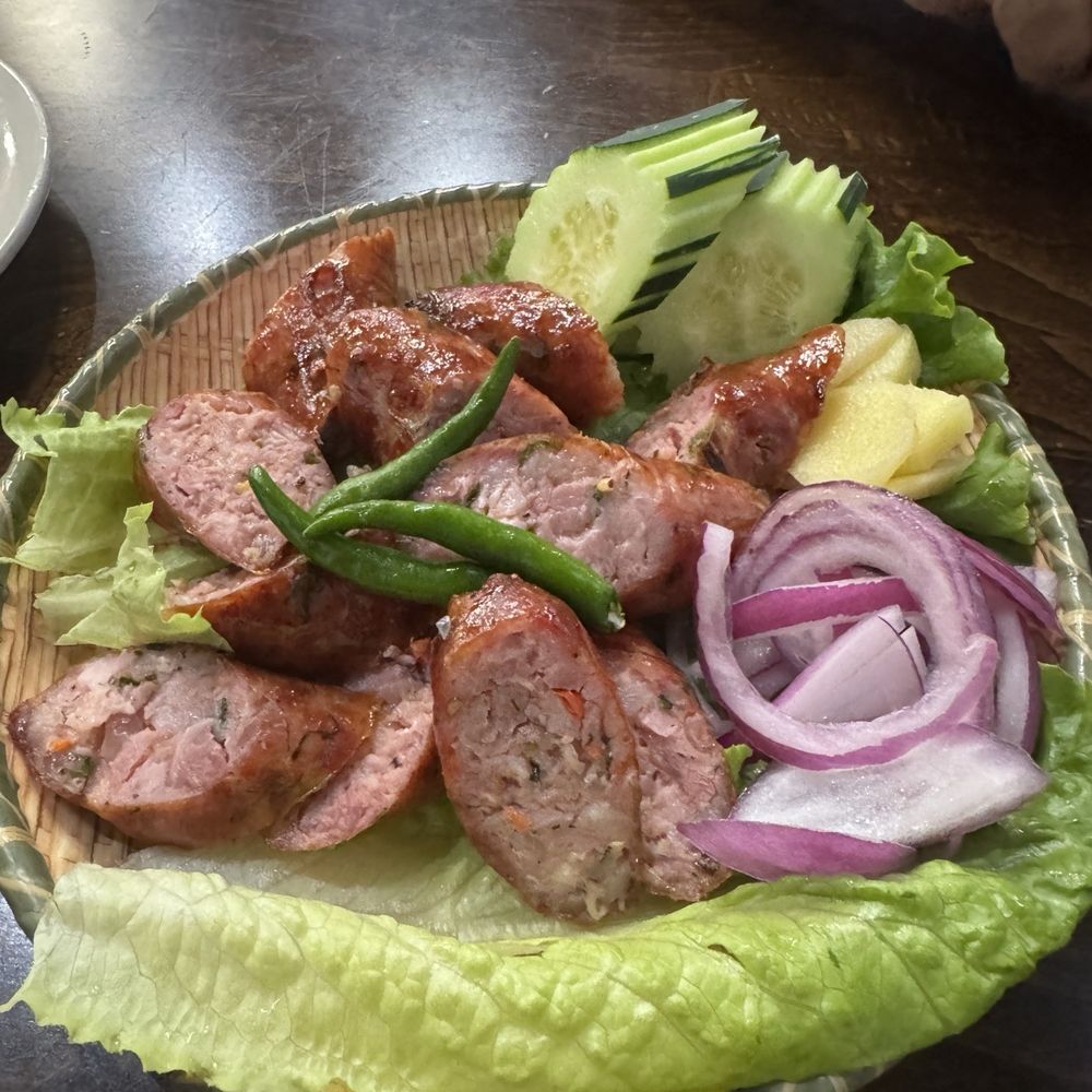 Black Thai Authentic Cuisine - Laos Sausage (Spicy) - Salad Near Me - Carrollton, Texas Black Thai Authentic Cuisine - Laos Sausage (Spicy) - Salad Near Me - Carrollton, Texas