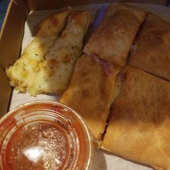 R J's Pizza - a box of pizza and a bowl of sauce - Pizza Near Me - Galax, Virginia R J's Pizza - a box of pizza and a bowl of sauce - Pizza Near Me - Galax, Virginia