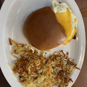 Three Little Birds Cafe - Breakfast sandwich on brioche bun with Hash Browns - Cafes Near Me - Stuart, Florida Three Little Birds Cafe - Breakfast sandwich on brioche bun with Hash Browns - Cafes Near Me - Stuart, Florida
