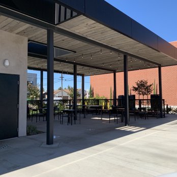 Starbucks - the outside of a coffee shop with tables and chairs - Coffee & Tea Near Me - Torrance, California