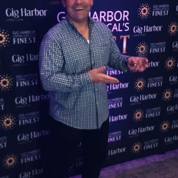 Maritime Chiropractic - Dr. Duppenthaler accepting the Gig Harbor Living Local Finest Chiropractor Award! - Chiropractors Near Me - Gig Harbor, Washington