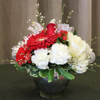 Talisman Flowers - Item # TAL7G
This gorgeous array of white and red tones, in a mirrored vase is sure to turn some heads. - Florists Near Me - Kanata, Ontario