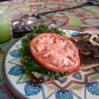 Kale Cafe Juice Bar & Vegan Cuisine - Hands made veggie burger with kale salad so yummy - Vegan Near Me - Daytona Beach, Florida Kale Cafe Juice Bar & Vegan Cuisine - Hands made veggie burger with kale salad so yummy - Vegan Near Me - Daytona Beach, Florida