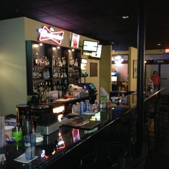 Ag Sports Bar - a bar with a lot of bottles on the counter - Sports Bars Near Me - Beaverton, Oregon Ag Sports Bar - a bar with a lot of bottles on the counter - Sports Bars Near Me - Beaverton, Oregon