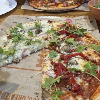 Blaze Pizza - Build your own pizza - half white sauce/half spicy red sauce And a carnivore pizza with extra toppings - Salad Near Me - Gainesville, Florida