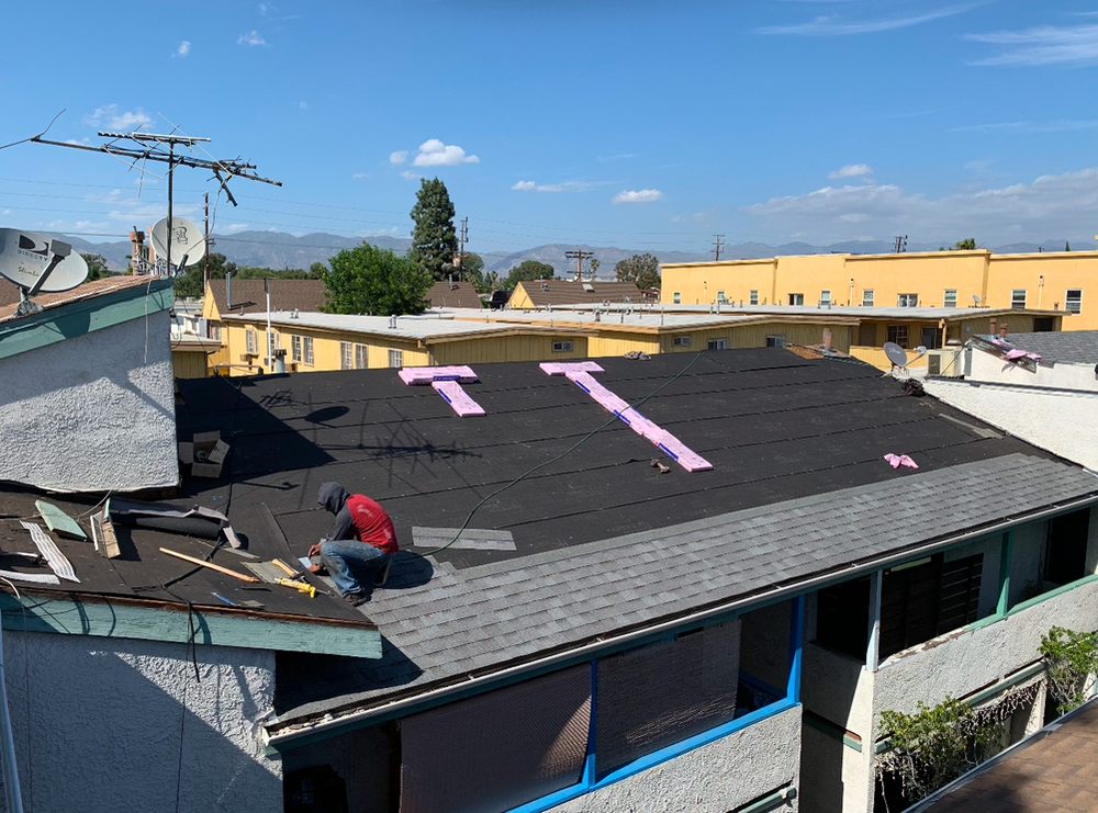 Slide of TopStamp Roofing