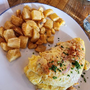 Land & Lake Kitchen - Smoked salmon omelet, complete with cream cheese. - American Near Me - Chicago, Illinois
