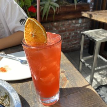 Rooftop - This is the "Hera's Peach" signature cocktail  Excellent! - New American Near Me - Walnut Creek, California