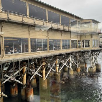 The Fish Hopper - I wonder about the story behind the foundations of this building over the water... must be a lot of history to it. - Seafood Near Me - Monterey, California