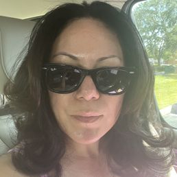 Hair root touch up, hair cut and style.