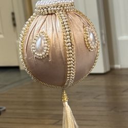 Hunt - Satin 3.17" ornament with rhinestones, pearls and tassel.