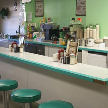 Stow Cafe - a counter with green stools - Breakfast & Brunch Near Me - Stow, Massachusetts