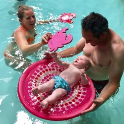 Swim With Phyn - Learning what it feels like to float on his own. Julie uses mirrors to help the babies focus their gaze upward.