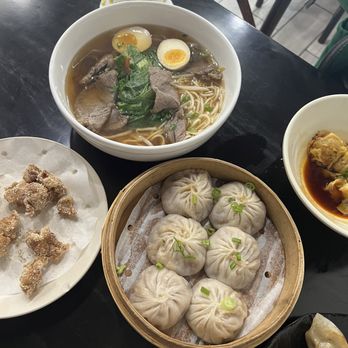 Serious Dumplings - Davie - Beef Noodle Soup Shanghai Soup Dumplings (6) Crispy Chicken Pork Wontons with Chili Sauce - Noodles Near Me - Davie, Florida Serious Dumplings - Davie - Beef Noodle Soup Shanghai Soup Dumplings (6) Crispy Chicken Pork Wontons with Chili Sauce - Noodles Near Me - Davie, Florida