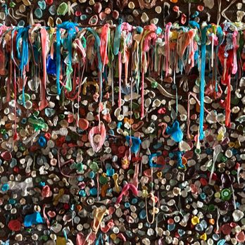 The Gum Wall - Gumsicles hanging from a windows sill!!! - Local Flavor Near Me - Seattle, Washington