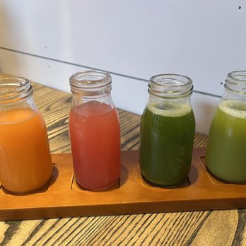 The Garden Table - Juice flight (left to right): neon nectar, lush love, tropic tonic, Hoosier heater - Breakfast & Brunch Near Me - Indianapolis, Indiana The Garden Table - Juice flight (left to right): neon nectar, lush love, tropic tonic, Hoosier heater - Breakfast & Brunch Near Me - Indianapolis, Indiana
