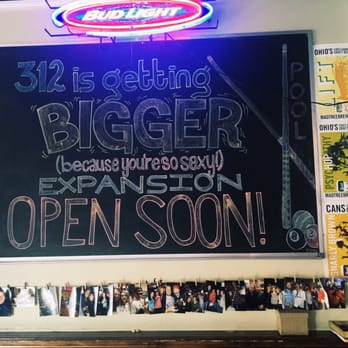 312 - a blackboard with a neon sign above it - Sports Bars Near Me - Cincinnati, Ohio