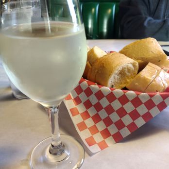Tomato Street - A glass of Riesling - Italian Near Me - Coeur D Alene, Idaho Tomato Street - A glass of Riesling - Italian Near Me - Coeur D Alene, Idaho