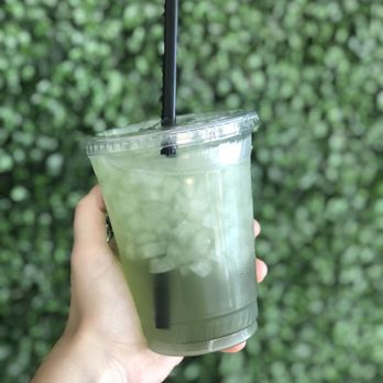 Hooked On Nutrition - a hand holding a drink with a straw - Juice Bars & Smoothies Near Me - Hanford, California Hooked On Nutrition - a hand holding a drink with a straw - Juice Bars & Smoothies Near Me - Hanford, California