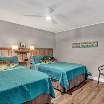 Reel Inn and Lodge - Catfish cabana Room 1. Two queen beds and combo lock for late hour check in. - Vacation Rentals Near Me - Quitman, Texas Reel Inn and Lodge - Catfish cabana Room 1. Two queen beds and combo lock for late hour check in. - Vacation Rentals Near Me - Quitman, Texas