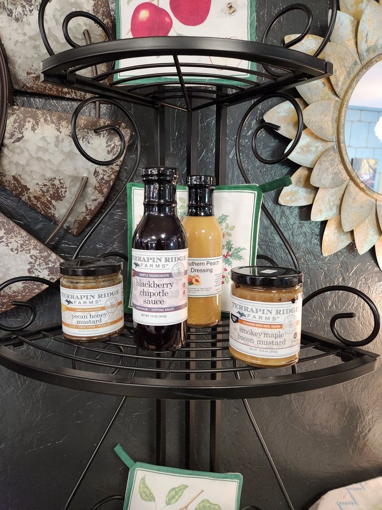 The Shoppes at Johnny Appleseed Logo